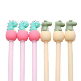  A set of 6 colorful dinosaur-shaped pens in shades of pink, mint, and beige. The pens feature cute dinosaur designs on the tops and come in a variety of pastel colors.