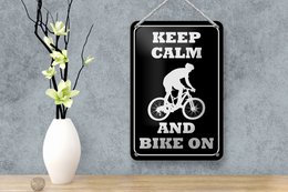 Tin sign saying 12x18cm Keep Calm and Bike on decoration