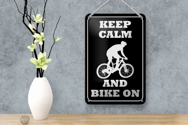 Tin sign saying 12x18cm Keep Calm and Bike on decoration
