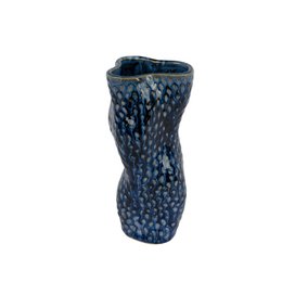Blue ceramic vase with textured surface, approximately 20 cm in height.