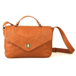 Stylish orange shoulder bag with a flap design and gold-tone hardware.