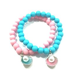 Children's bracelet with pink and blue beads, featuring pearl and shell charms.