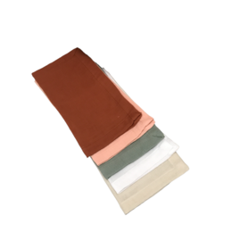 Soft, absorbent napkins in a variety of earthy color options including dusty rose, terracotta, rust, olive green, and more. Ideal for casual dining or home decor.