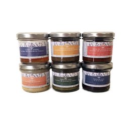 "Box of 6 organic spreads 'Apéritif sous les Oliviers' - Assortment of savory spreads in various flavors including olives, herbs, and spices. Ideal for appetizers or snacks."

The image shows a box containing six glass jars of organic savory spreads. The product title is "Box of 6 organic spreads 'Apéritif sous les Oliviers'", indicating that the spreads are meant to be enjoyed as appetizers or hors d'oeuvres. 

Based on the visual information, the key details that can be extracted are:

Colors: The spreads come in various colors including green, orange, and purple, suggesting different flavor profiles.
Materials: The spreads are packaged in glass jars with metal lids.
Style: The packaging and presentation have a rustic, artisanal aesthetic.
Shapes: The jars are round in shape.
Flavors: The spreads appear to be savory in nature, likely containing ingredients like olives, herbs, and spices.

This description would be suitable for including in a semantic search for products related to "appetizer" or "savory spread", as it provides relevant details about the product's appearance, ingredients, and intended use.