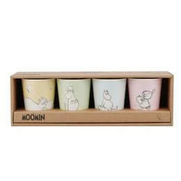 Set of 4 colorful Moomin character tumblers in a wooden display case.