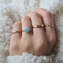 Anello Amazoniet Goud - Storia dell'equilibrio