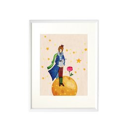 A whimsical wall art piece featuring the Little Prince standing on a planet with a rose. The illustration has a vibrant, colorful style with stars in the background.