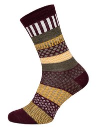  Colorful patterned wool socks in various shades of orange, brown, blue, and pink. The socks feature a mix of stripes, zigzags, and geometric designs.