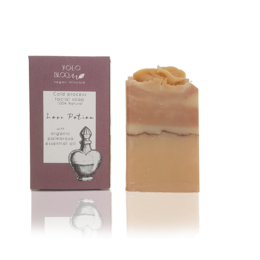 A heart-shaped, handmade facial soap bar with a floral, romantic scent. Made with natural ingredients like olive oil and shea butter.