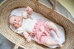 Pink embroidered muslin high waist bloomers for infants, available in sizes newborn to 18 months. Features a soft, lightweight muslin fabric with delicate embroidered details.