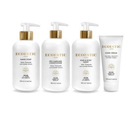 Eco-friendly shampoo set with natural ingredients. Includes shampoo, conditioner, and hand soap in white bottles with gold accents.