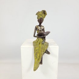 Bronze-Skulptur "Petite femme assise" by Hamed Nikiema | 16 cm | Unikate