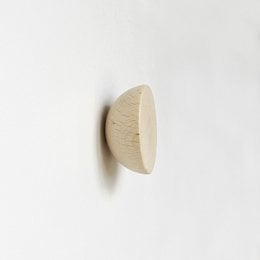 Round beech wood wall hook/knob, available in 6cm and 5cm diameters, for hanging coats, towels, or other items.