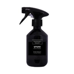 A 300 ml room spray in the Uyuni scent from the Treatments® brand. The spray bottle has a black color and a trigger-style sprayer.