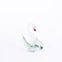 Glass swan figurine in white and black color variants. Decorative glass animal statue for home or office.