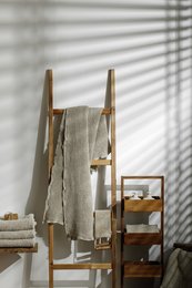 Large, waffled linen bathroom towel in a neutral color. Soft, absorbent, and durable material suitable for everyday use.