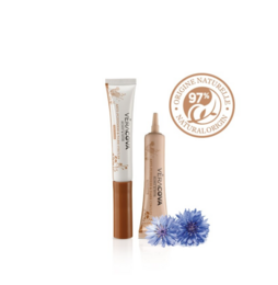 Anti-puffiness and dark circles eye contour cream in a tube and applicator. Cream is light beige in color.
