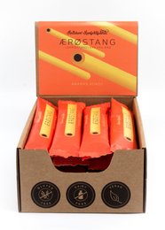 Pineapple and coconut flavored candy bars in an orange and red packaging.
