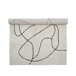  A white cotton rug with abstract black line patterns, suitable for a child's room.