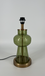 Olive green glass table lamp with brass base and black lamp shade. Cylindrical shape with tapered top.
