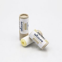 Vanilla-scented lip balm in a cylindrical container.