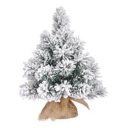  Artificial Christmas tree with green plastic branches and snow-like flocking, creating a realistic winter wonderland appearance.