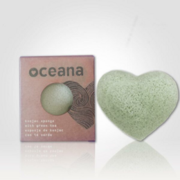Green konjac sponge with green tea extract, natural exfoliating skin care tool.