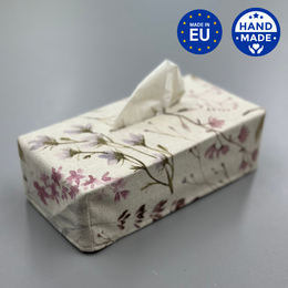 Floral tissue box cover made of fabric, with a delicate pattern of small purple flowers and leaves.