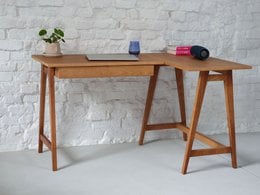 Ash or oak L-shaped desk with drawers, available in left or right-handed configurations and two size options.