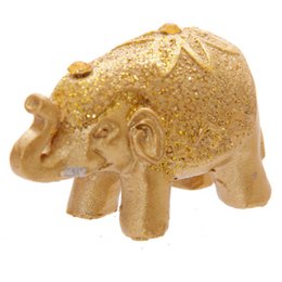 Metallisch glitzernder Glückselefant in einer Mini-Geschenktüte