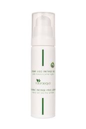 White anti-aging face cream in a pump bottle. Contains natural ingredients for skin rejuvenation.