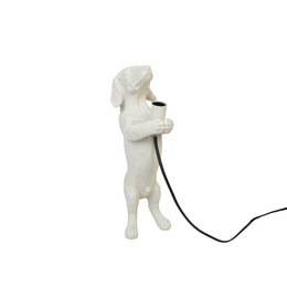  A table lamp in the shape of a dachshund dog, made of polyresin material in a sand color. The lamp has an E14 bulb socket and measures 10x15x38cm.