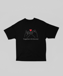  Oversized black and white t-shirt with text "Together till the end" and heart icon design. Available in a variety of sizes and colors including white, black, and ecru.
