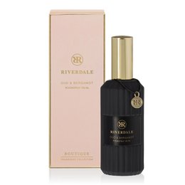  Boutique Roomspray Oud & Bergamot 100ml roze, a luxurious room spray with notes of oud and bergamot, packaged in a sleek black bottle with gold accents.