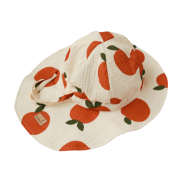 Soft, lightweight muslin baby hat in various colors including beige, brown, lilac, white, and patterned vichy. Designed for summer wear, the hat features a sun-protective design and is available in sizes from small to extra-large.