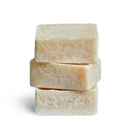  White cubed fragrance blocks made of amber-scented wax. Rectangular shape with smooth surface.
