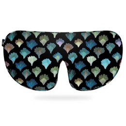 Dark aqua silk sleep mask with a scalloped pattern in shades of blue, green, and gray.
