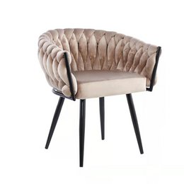 Upholstered dining chair with tufted velvet seat and black metal frame. Suitable for modern or traditional dining rooms.