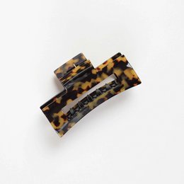  Tortoiseshell hair clips, suitable for holding back hair in a casual, stylish manner.