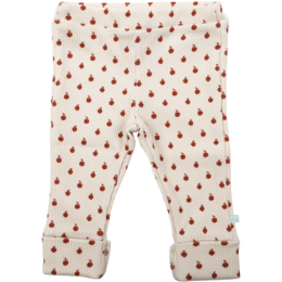 Baby leggings in off-white and red with a polka dot pattern. Suitable for infants and toddlers.