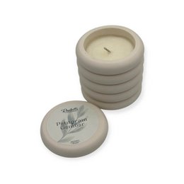  Tall, round white scented candle with a petitgrain and ginger fragrance.