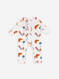 A white baby romper with a colorful print featuring various candies and sweets. The romper has a wrap-around design and is available in sizes 3-6 months, 6-9 months, 9-12 months, and 12-18 months.
