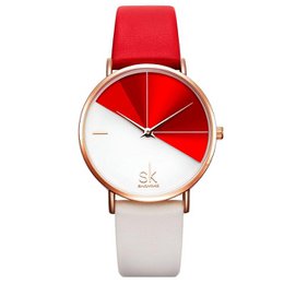 This watch features a modern, minimalist design with a red and white dial. The case is made of stainless steel with a rose gold finish, and the band is made of a durable red leather material. The watch has a quartz movement and is water-resistant up to 30 meters.