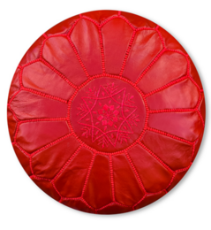 A round, red leather pouf with a decorative star pattern in the center. The pouf has a plush, cushioned design and appears to be suitable for use as an ottoman or footstool.