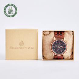 A handmade, vegan wood watch with a chronograph feature and a red and black color scheme.