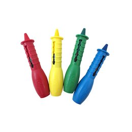 Colorful wax crayons in red, yellow, green, and blue. Sensory toys for children.