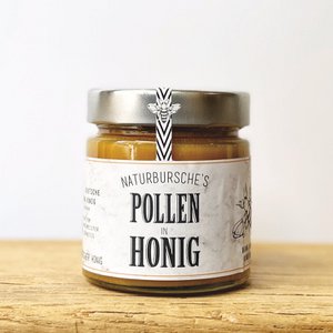 Natuurlijke jongen stuifmeel in honing