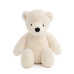 Soft, plush white polar bear stuffed animal with black eyes and nose.