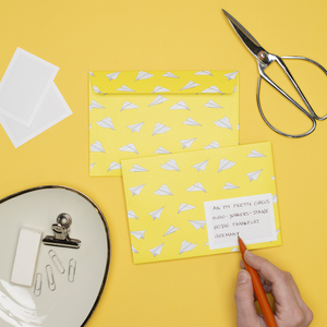 8 envelopes paper planes yellow