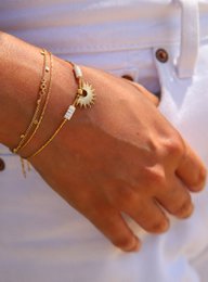 Pulsera Litha, sol caqui, oro, oro mate y lentejuelas